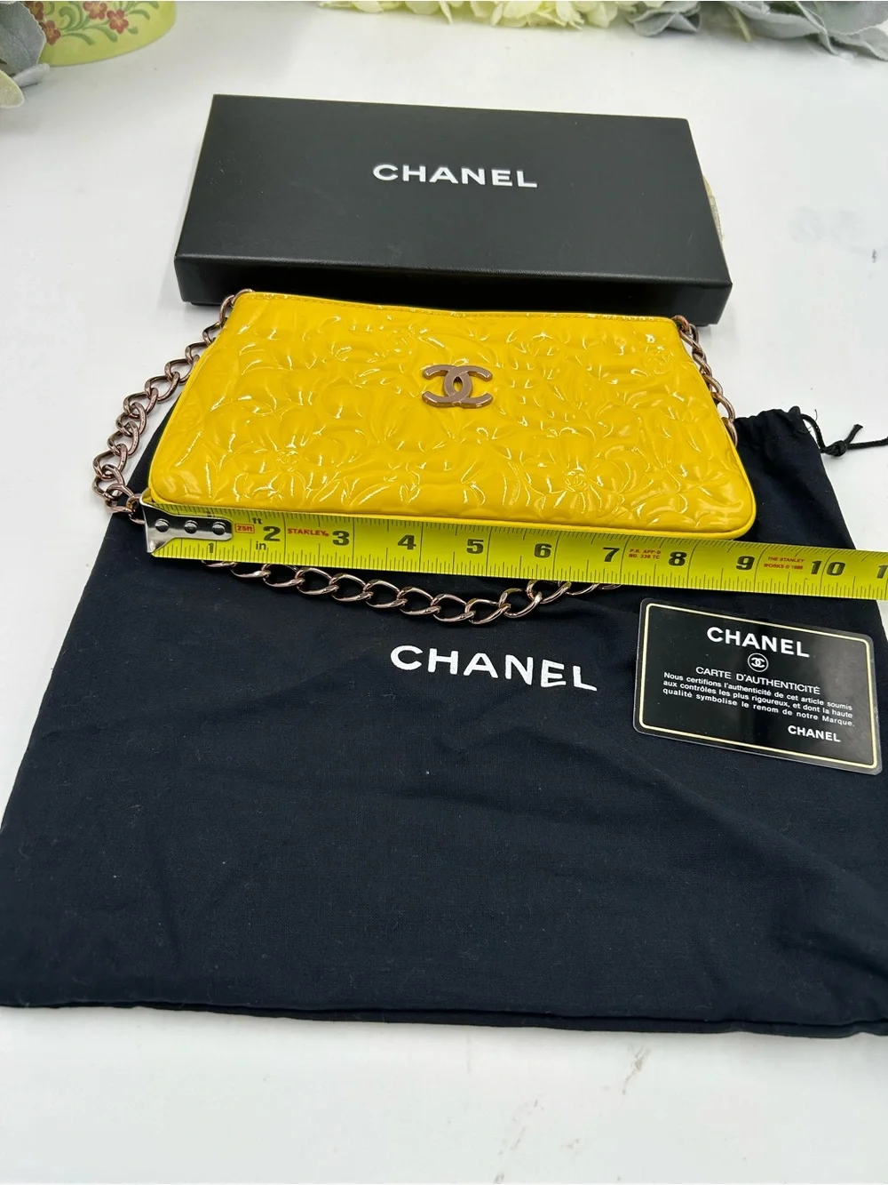 Women's Chanel patent leather floral embossed shoulder bag made in Italy